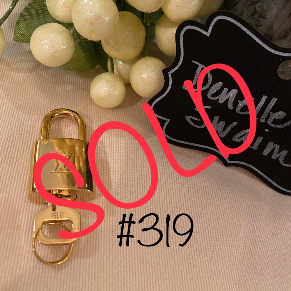 Authentic Louis Vuitton LV Lock and Key 319